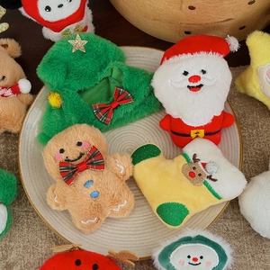 Charming assorted Christmas plush ornaments with Santa and tree motifs for festive decor