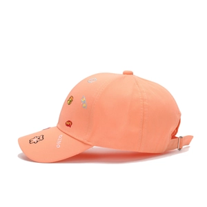 Orange kids baseball cap with animal embroidery and adjustable metal buckle outdoors