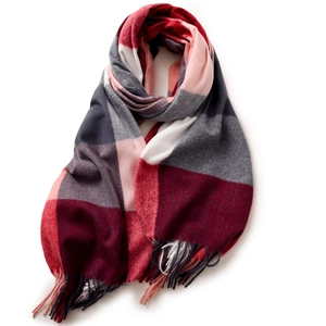 Red and pink plaid imitation cashmere scarf with tassels on white background