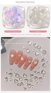 Macro detail of mixed size aurora heart nail sequins and sparkling 3D charms for manicure
