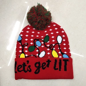 Knitted Christmas beanie in red with Let's get LIT text and colorful bulb patterns