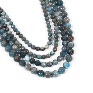 Natural blue kyanite round beads for DIY jewelry making in multiple sizes on white background
