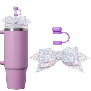 Close-up of purple sequin bow and silicone straw cap set for tumbler cups