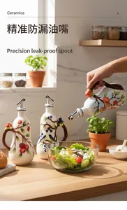 Action shot of pouring oil from a ceramic dispenser with hand-painted cherry patterns
