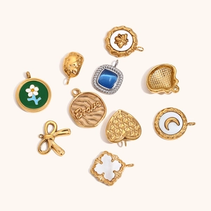 Various 18K gold plated stainless steel heart and flower pendants with blue gemstones