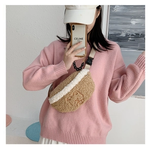 Detail of cute teddy bear embroidery on fluffy plush crossbody bag for women