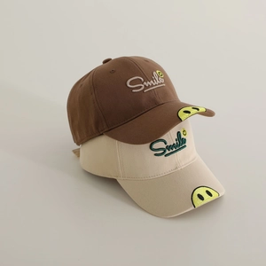 Kids cotton baseball caps in brown and beige with Smile embroidery and yellow face icons