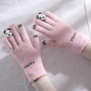 Close-up of cute pink knit winter gloves featuring 3D panda design and warm fleece fabric.