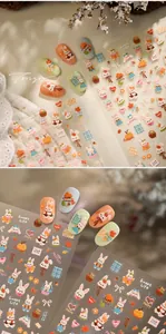 Detail of 3D embossed rabbit and pumpkin nail art stickers with autumn floral patterns