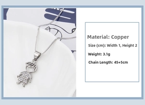 Detail of silver-plated copper boy pendant necklace with sparkling cubic zirconia stones