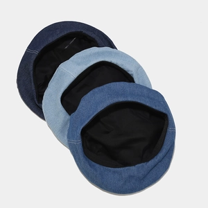 Three denim beret hats in deep, medium, and light blue washes with white topstitching