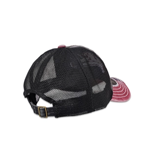 Detail of NYC trucker hat with grey washed cotton, black mesh, and bronze metal buckle