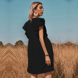 Women's black V-neck bohemian dress with ruffle sleeves and full skirt in field