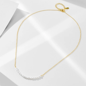 Minimalist S925 silver necklace with white freshwater pearls and gold smile pendant