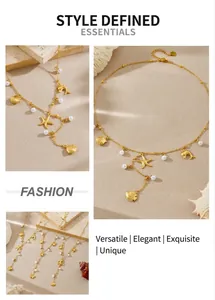 Detail of gold ocean necklace with starfish, shell pendants and white pearls charms