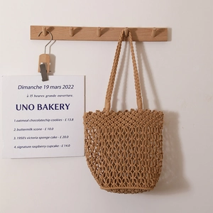 Hollow out cotton woven shoulder bag in khaki for beach vacations and casual summer wear