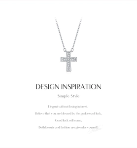 Macro detail of silver S925 sterling silver cross pendant necklace with moissanite stones