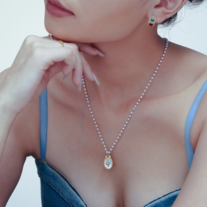 Collana di perle con ciondolo a stella in madreperla ovale in stile vintage