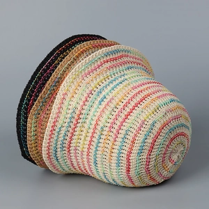 Detail showing the breathable knit texture and colorful stripe pattern on women bucket hats