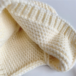 Winter baby knit hat with bear ears in cream white featuring thick ribbed texture design