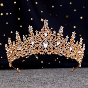 Luxurious gold crystal tiara for brides with shimmering rhinestones and baroque style