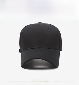 Front view detail of a plain black mesh baseball cap with curved brim and breathable panels