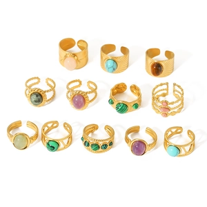 Collection of gold stainless steel rings featuring colorful semi-precious natural stones