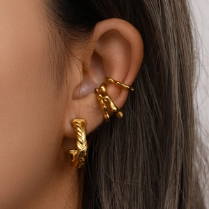 Golden 18K plated stainless steel earring set with twisted hoop and rivet style ear cuffs