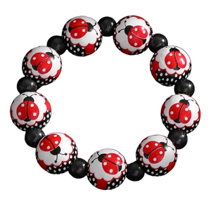 Bracelet élastique perlé avec perles noires brillantes et motifs coccinelles mignonnes
