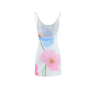 Detailed view of the thin straps and vibrant floral print on this summer sundress