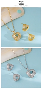 Detailed view of geometric twisted triangle necklace and stud earrings set in gold and silver