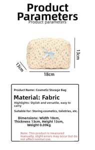 Detailed view of floral quilted cotton makeup bag with dimensions 18x13x13cm and blue bow