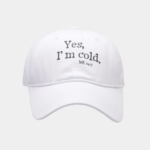 Detail of white cotton baseball cap showing black letter print and six-panel structure