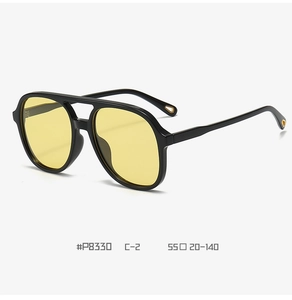 Detail view of P8330 pilot sunglasses with yellow lenses and frame size 55-20-140