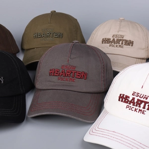 Detail view of cotton canvas baseball caps with 3D letter embroidery in five colors