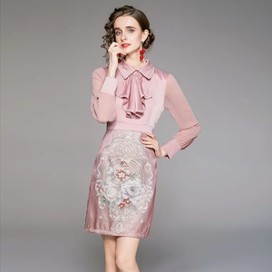 Elegant pink long-sleeved dress with vintage floral embroidery and ruffle collar