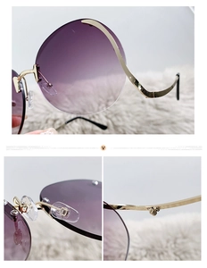 Detail view of purple gradient lens and wavy gold metal temples on rimless sunglasses