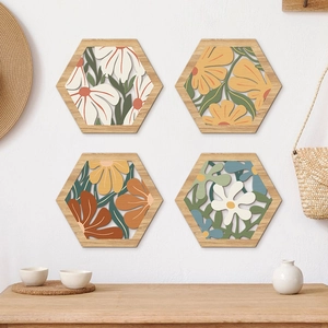 Set of 4 hexagonal bohemian floral wooden wall plaques with colorful hollow designs