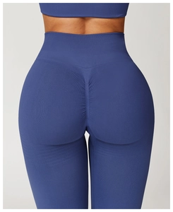 Close-up of seamless ribbed leggings featuring scrunch butt lifting and wide high waistband