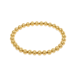 Dettaglio di un bracciale a sfere dorate lucide con un classico design metallico sferico