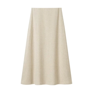 Detail view of light beige high-waisted A-line knit maxi skirt with fine texture
