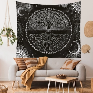 Detailed view of black and white Tree of Life tapestry in a modern living room setting