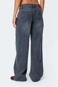 Back view of vintage dark wash wide-leg denim jeans with high-quality stitching details