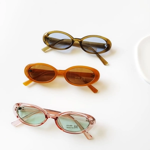Kids vintage oval sunglasses with UV400 protection in olive, amber, and pink frames