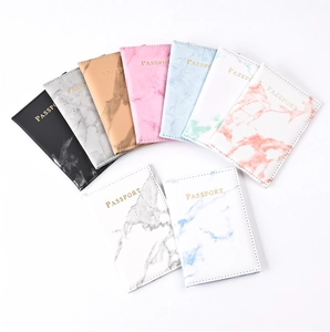 Detailed collection of PU leather passport holders in marble and solid colors with gold foil text