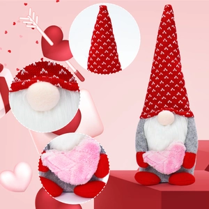Detail view of Valentine's gnome showing knitted hat texture and plush heart ornament