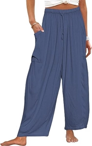 Détail du pantalon sarouel en lin bleu foncé avec taille élastique à cordon et poches