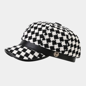 Retro houndstooth tweed newsboy cap for women with black leather trim and M logo
