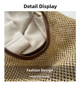 Detailed macro view of woven straw texture with brown leather trim and fabric lining