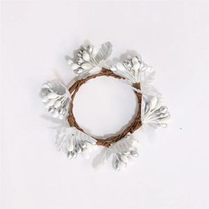 Silver and white festive berry napkin ring with mesh leaves on a white background